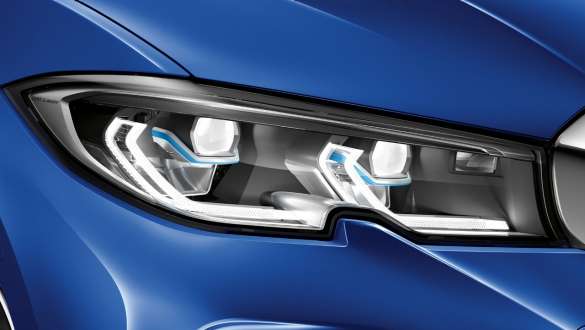 BMW 3 Series Sedan (G20), BMW Laserlight. BMW 3 Series Sedan (G20), BMW Laserlight. Lateral close-up of the left front headlight with BMW Laserlight.