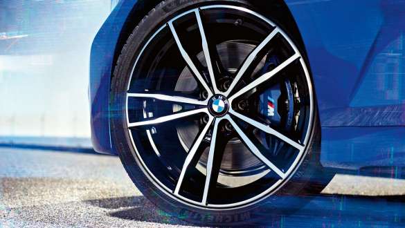 BMW 3 Series Sedan (G20), M Sport brake. Detailed view of the wheel oft he BMW 3 Series Sedan (G20) with M Sport brake.