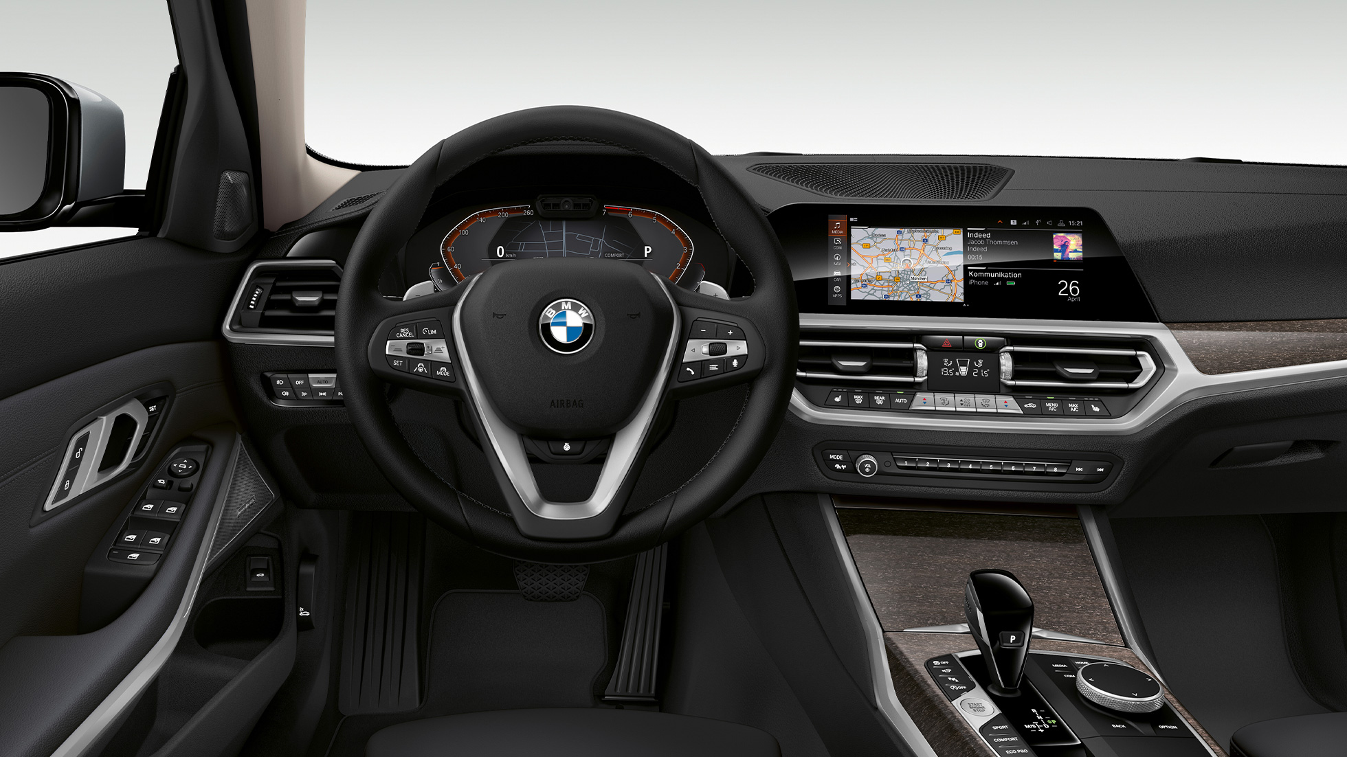 BMW 3 Series Sedan, Modell Luxury Line Cockpit. G20 Frontal close-up of the driver's cockpit of the BMW 3 Series Sedan with Model Luxury Line features. G20