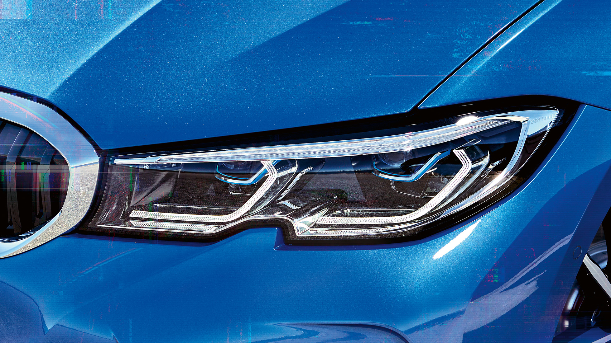 BMW 3 Series Sedan, BMW Laserlight. G20 Lateral close-up of the right front headlights with BMW laserlight. G20
