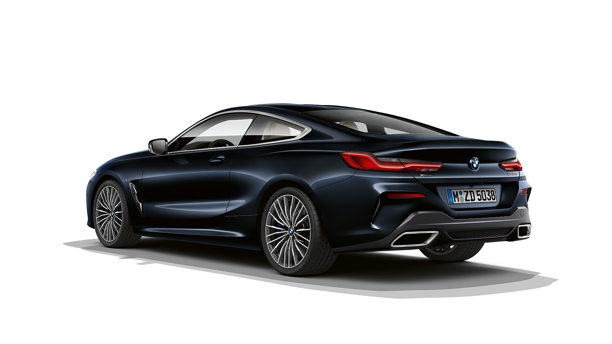 BMW 8 Series Coupé, three-quarter back view. G15 BMW 8 Series Coupé, Carbon Black metallic, three-quarter back view. G15