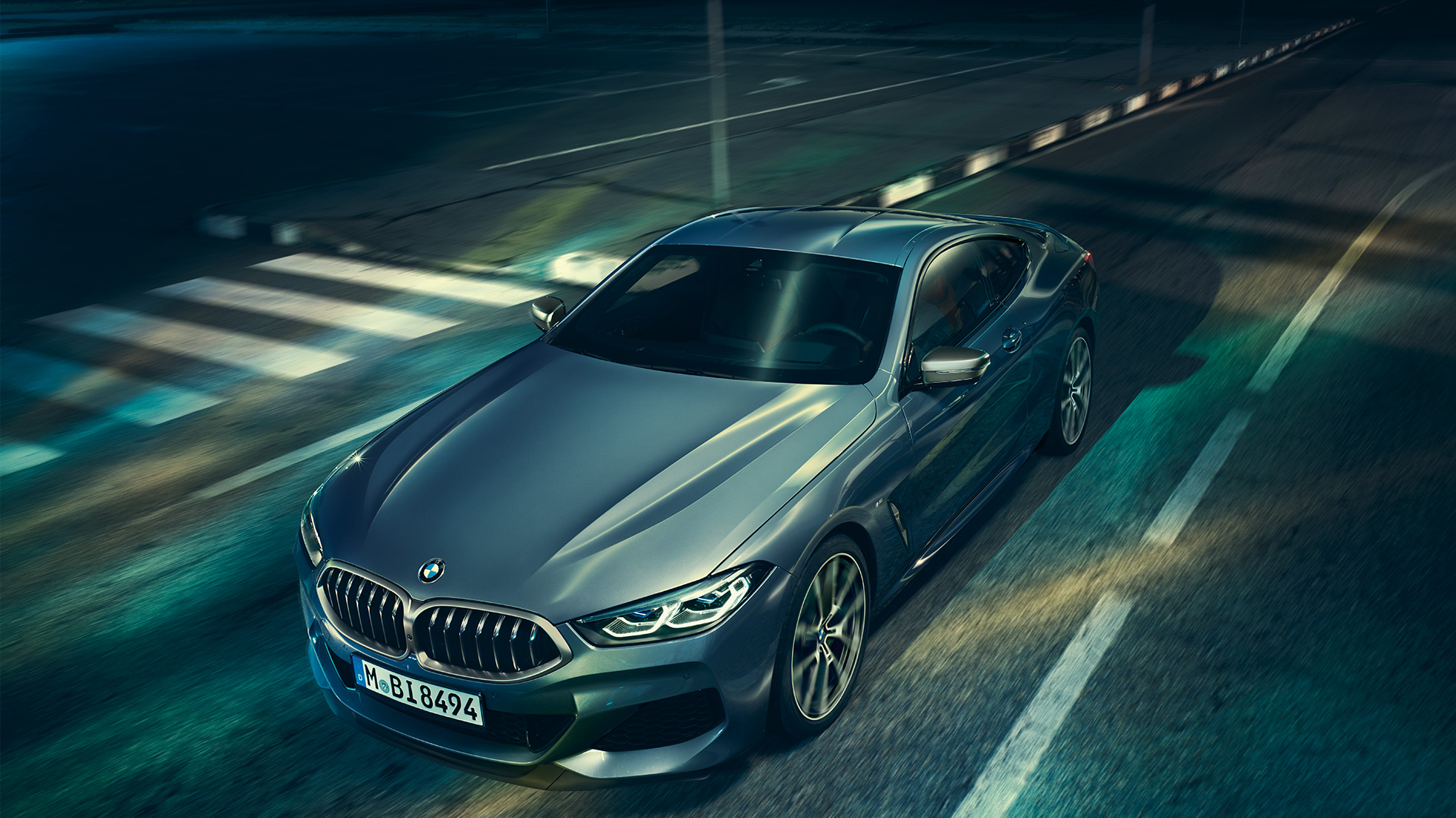BMW 8 Series Coupé, three-quarter front view. G15 BMW 8 Series Coupé, three-quarter front view, standing with view on engine bonnet. G15