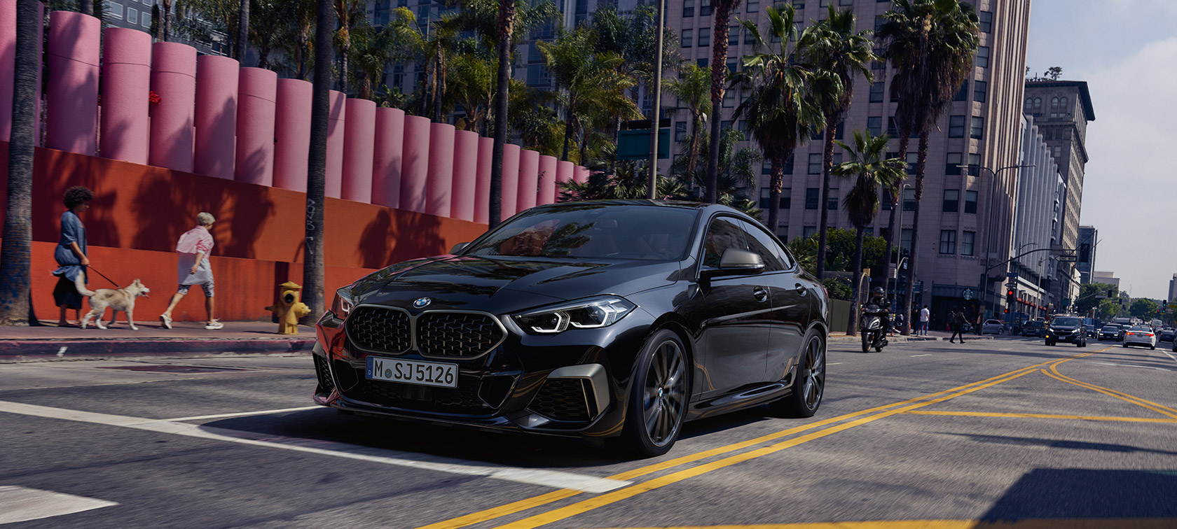 BMW M235i xDrive Gran Coupé three-quarter front view BMW M235i xDrive Gran Coupé 2020 Black Sapphire metallic F44 three-quarter front view