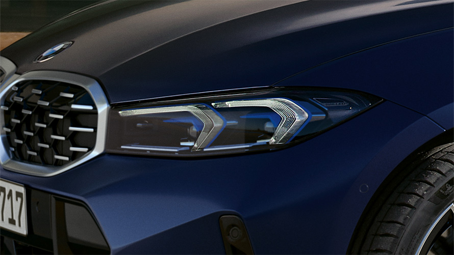 BMW M340i xDrive Touring G21 Frozen Tanzanite Blue LED front lights close-up
