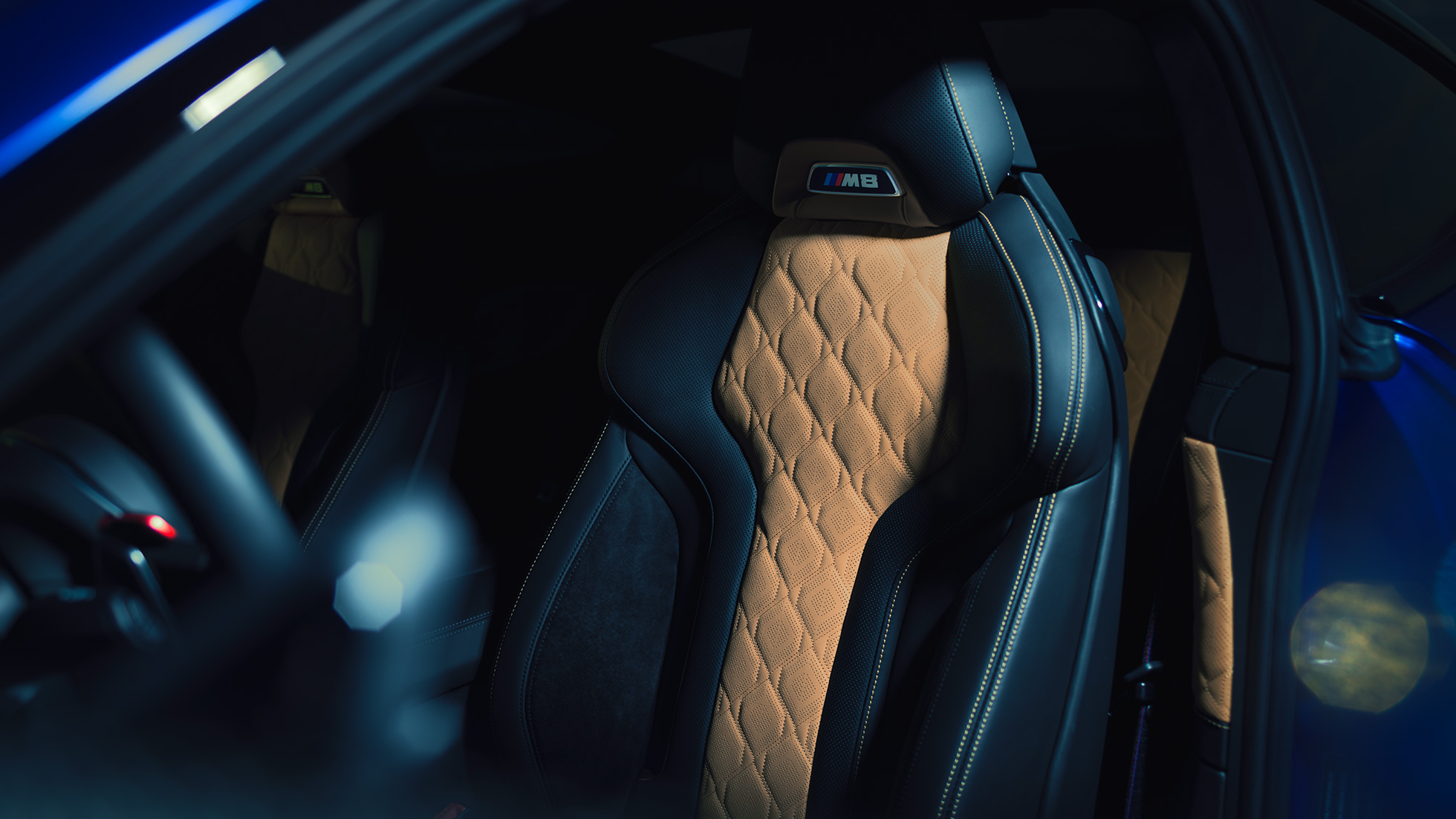 BMW M8 Competition Coupé, M Sport seat. F92 BMW M8 Competition Coupé, M Sport seat with M8 badge and upholstery in full leather 'Merino' Black with contrast Midrand Beige. F92