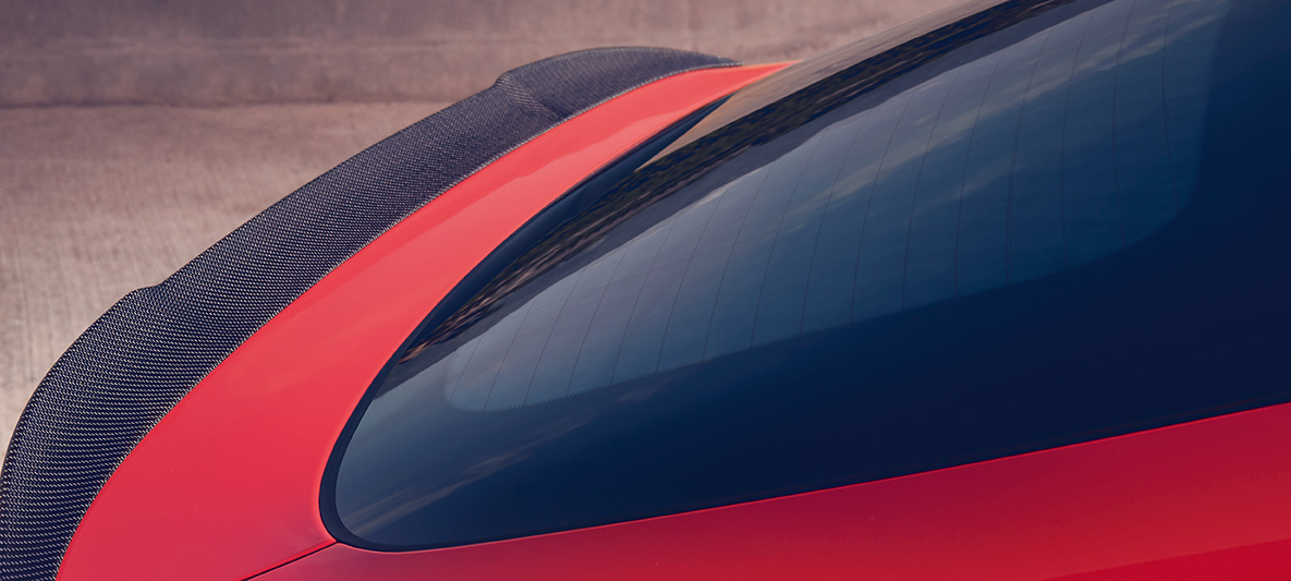 BMW X4 M Competition, M rear spoiler in carbon. F98 BMW X4 M Competition in Toronto Red metallic, exterior, M Carbon exterior package, M rear spoiler in carbon. F98