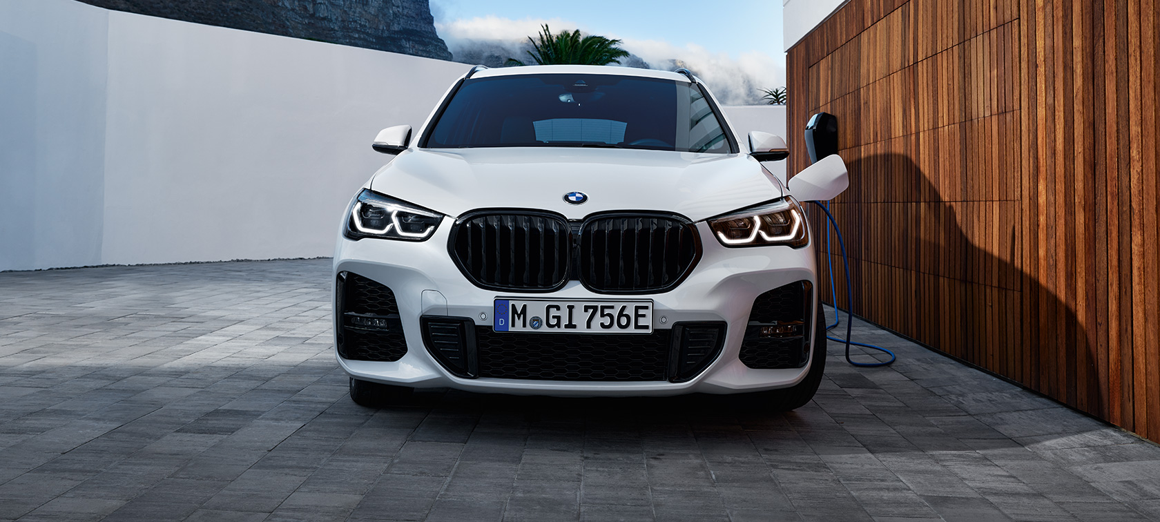 Plug-in hybrid BMW X1 xDrive25e F48 front view Plug-in hybrid BMW X1 xDrive25e F48 front view charging