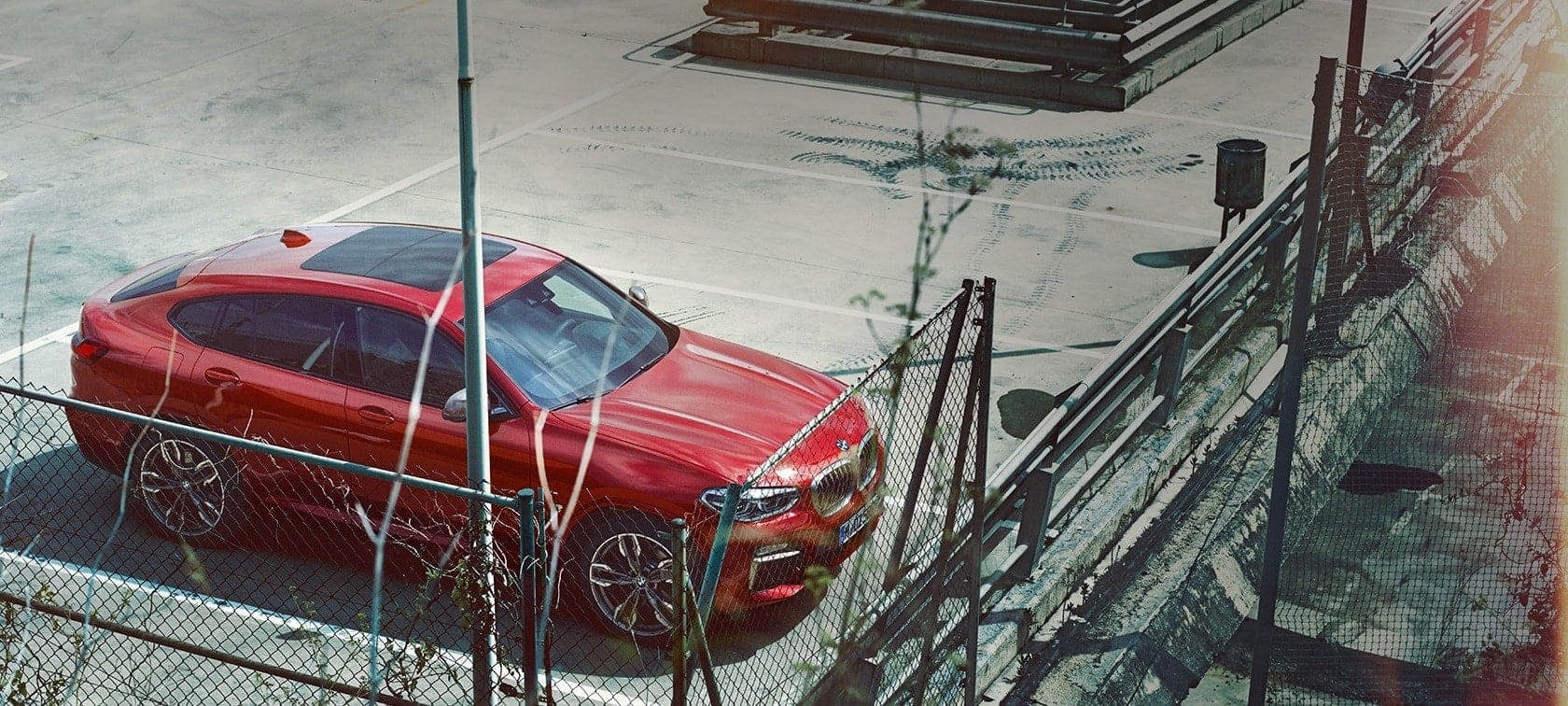 BMW X4 parking G02 BMW X4 G02 2018 Flamenco Red brilliant effect parking on parking deck bird’s eye view