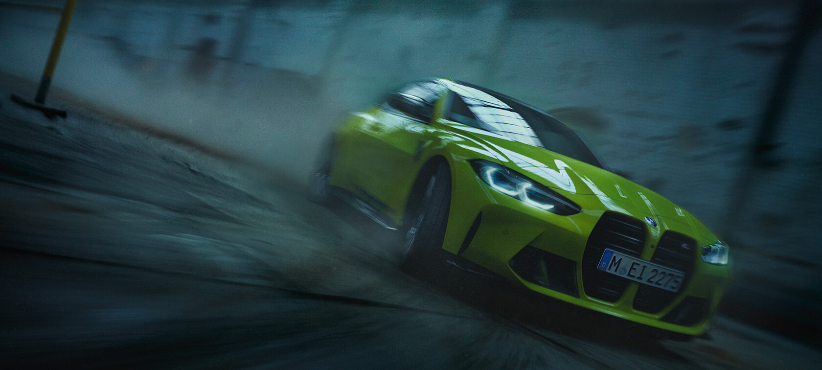 BMW M4 G82 2020 Sao Paulo Yellow three-quarter front view in motion